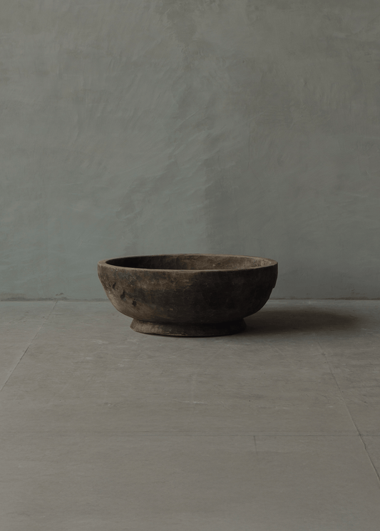 Wind-carved wooden bowl